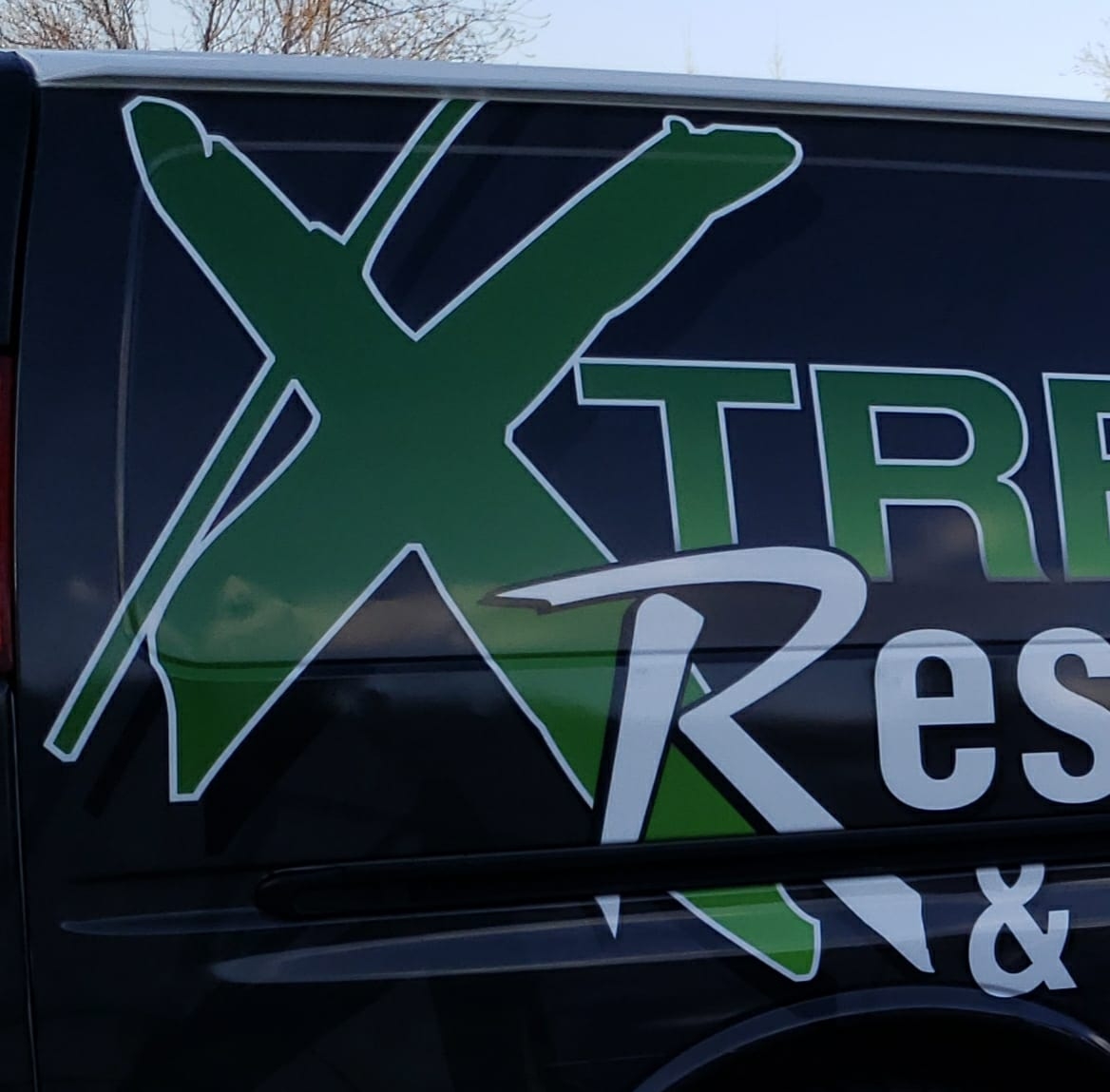 Xtreme Restoration and Construction logo